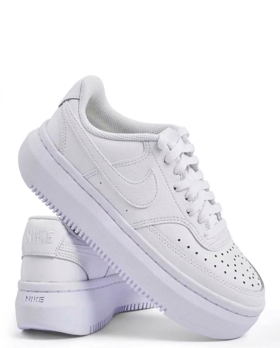 Triple white Nike Court Vision Alta platform sneakers on white